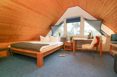 Ein Bett oder Betten in einem Zimmer der Unterkunft Haus Nastassja App 02