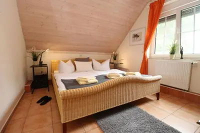 Ein Bett oder Betten in einem Zimmer der Unterkunft Haus Nastassja App 02