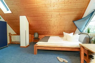 Ein Bett oder Betten in einem Zimmer der Unterkunft Haus Nastassja App 02