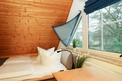 Ein Bett oder Betten in einem Zimmer der Unterkunft Haus Nastassja App 02