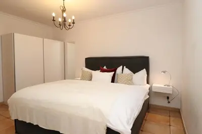 Ein Bett oder Betten in einem Zimmer der Unterkunft Haus Nastassja App 03