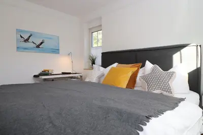 Ein Bett oder Betten in einem Zimmer der Unterkunft Haus Nastassja App 03