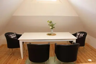 Ein Sitzbereich in der Unterkunft Strandhaus Strandhaus, App 01