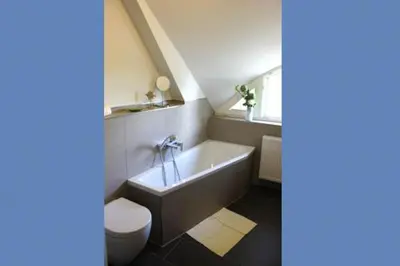Ein Badezimmer in der Unterkunft Strandhaus Strandhaus, App 01