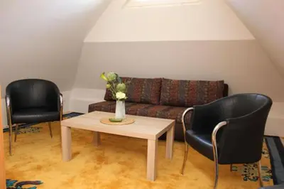 Ein Sitzbereich in der Unterkunft Strandhaus Strandhaus, App 02