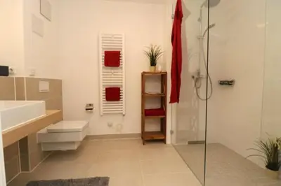 Ein Badezimmer in der Unterkunft Bickbeeren Schweiz Villa Amalia, App 02