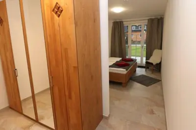 Ein Bett oder Betten in einem Zimmer der Unterkunft Bickbeeren Schweiz Villa Amalia, App 02