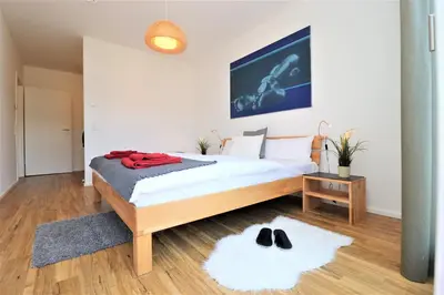 Ein Bett oder Betten in einem Zimmer der Unterkunft Bickbeeren Schweiz Villa Amalia, 