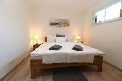 Ein Bett oder Betten in einem Zimmer der Unterkunft Bickbeeren Schweiz Penthouse Villa Amalia
