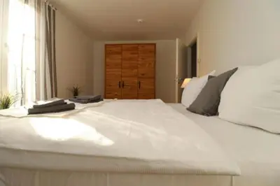 Ein Bett oder Betten in einem Zimmer der Unterkunft Bickbeeren Schweiz Penthouse Villa Amalia