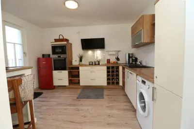 Küche/Küchenzeile in der Unterkunft Bickbeeren Schweiz Penthouse Villa Amalia