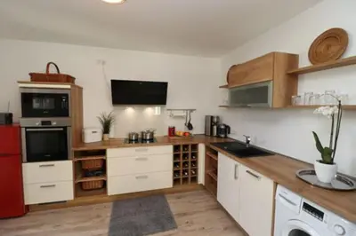 Küche/Küchenzeile in der Unterkunft Bickbeeren Schweiz Penthouse Villa Amalia