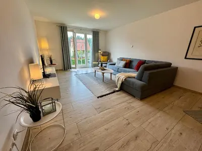 Ein Sitzbereich in der Unterkunft Bickbeeren Schweiz Villa Catrina, App 05