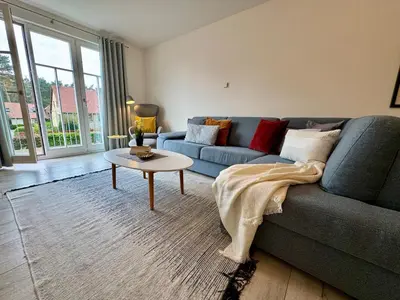 Ein Sitzbereich in der Unterkunft Bickbeeren Schweiz Villa Catrina, App 05