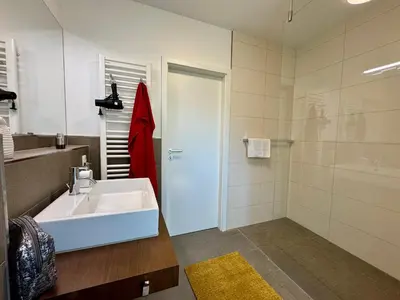 Ein Badezimmer in der Unterkunft Bickbeeren Schweiz Villa Catrina, App 06