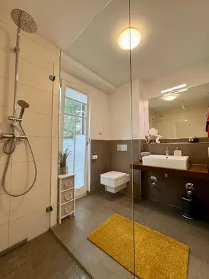Ein Badezimmer in der Unterkunft Bickbeeren Schweiz Villa Catrina, App 06