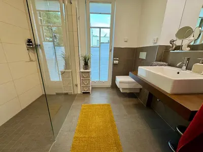 Ein Badezimmer in der Unterkunft Bickbeeren Schweiz Villa Catrina, App 06