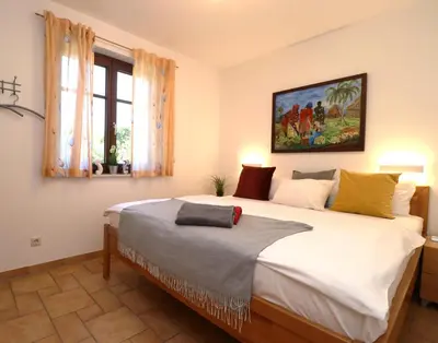 Ein Bett oder Betten in einem Zimmer der Unterkunft Ferienwohnungen Stückweg Schlehenhaus, App 01