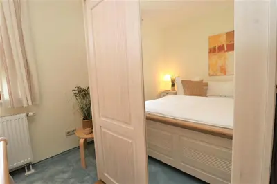 Ein Bett oder Betten in einem Zimmer der Unterkunft Alter Krug App 06