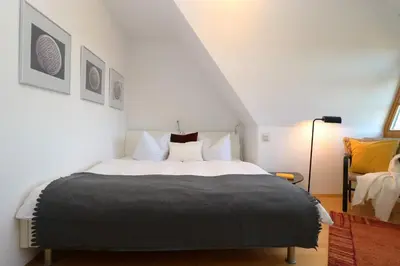 Ein Bett oder Betten in einem Zimmer der Unterkunft Alter Krug App 15
