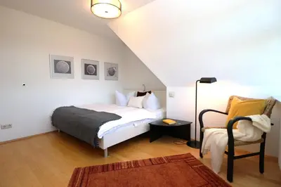 Ein Bett oder Betten in einem Zimmer der Unterkunft Alter Krug App 15