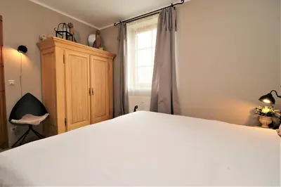 Ein Bett oder Betten in einem Zimmer der Unterkunft Alter Krug App 16