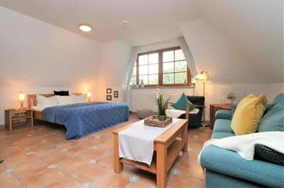 Ein Bett oder Betten in einem Zimmer der Unterkunft Alter Krug App 25