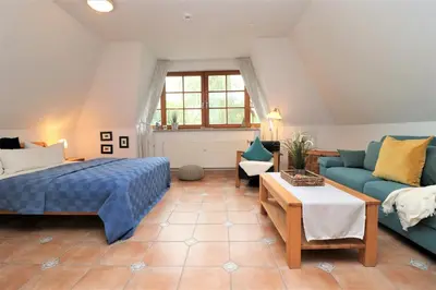 Ein Bett oder Betten in einem Zimmer der Unterkunft Alter Krug App 25