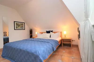 Ein Bett oder Betten in einem Zimmer der Unterkunft Alter Krug App 25