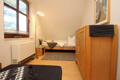 Ein Bett oder Betten in einem Zimmer der Unterkunft Ferienhäuser Ferienhaus Xenia