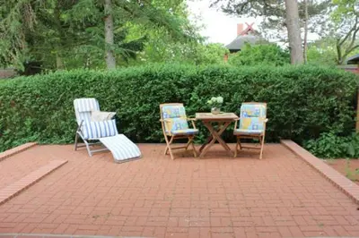 Ein Garten an der Unterkunft Ferienhäuser Ferienhaus Xenia