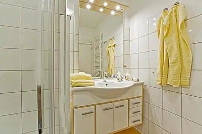 Ein Badezimmer in der Unterkunft Mühlenweg, App 01