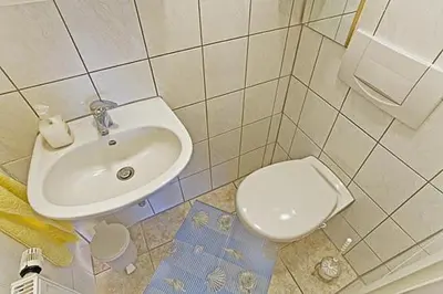 Ein Badezimmer in der Unterkunft Mühlenweg, App 01