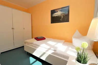 Ein Bett oder Betten in einem Zimmer der Unterkunft Achtern Hafen App 01
