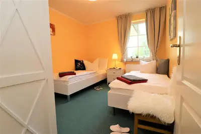 Ein Bett oder Betten in einem Zimmer der Unterkunft Achtern Hafen App 02