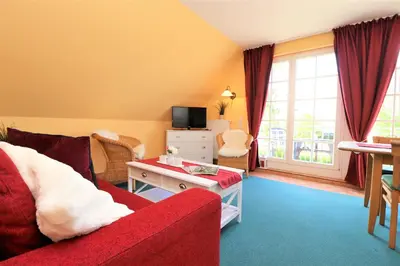 Ein Bett oder Betten in einem Zimmer der Unterkunft Achtern Hafen App 03