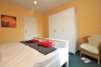 Ein Bett oder Betten in einem Zimmer der Unterkunft Achtern Hafen App 03