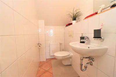 Ein Badezimmer in der Unterkunft Achtern Hafen App 03