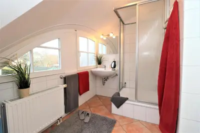 Ein Badezimmer in der Unterkunft Achtern Hafen App 04