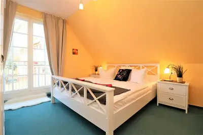 Ein Bett oder Betten in einem Zimmer der Unterkunft Achtern Hafen App 04