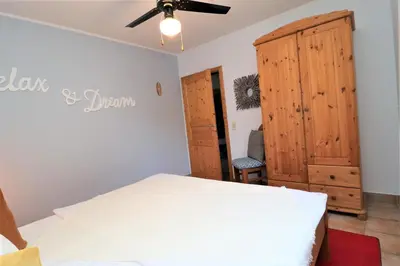 Ein Bett oder Betten in einem Zimmer der Unterkunft Am Leuchfeuer App 01