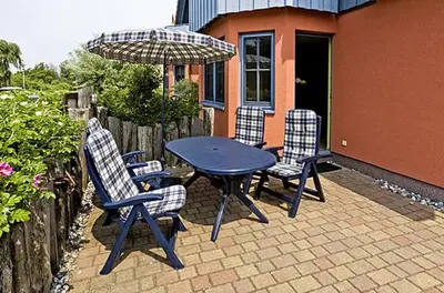 Ein Patio oder anderer Außenbereich in der Unterkunft Am Leuchfeuer App 01