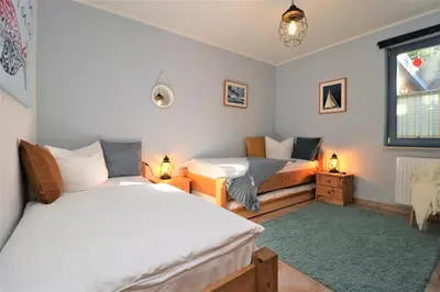 Ein Bett oder Betten in einem Zimmer der Unterkunft Am Leuchfeuer App 01
