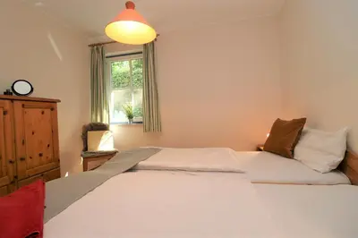 Ein Bett oder Betten in einem Zimmer der Unterkunft Am Leuchfeuer App 05