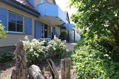 Ein Garten an der Unterkunft Am Leuchfeuer App 05