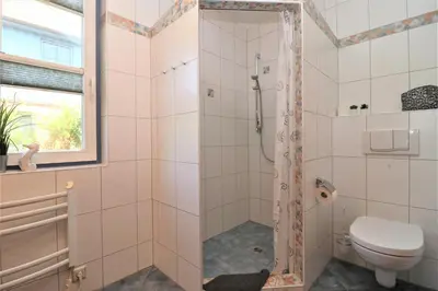 Ein Badezimmer in der Unterkunft Am Leuchfeuer App 05