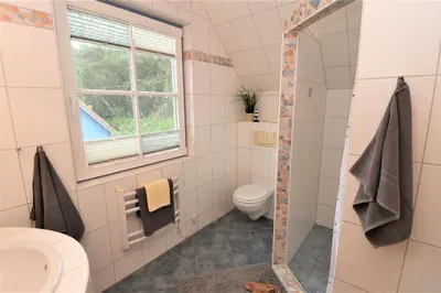 Ein Badezimmer in der Unterkunft Am Leuchfeuer App 06