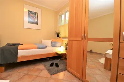 Ein Bett oder Betten in einem Zimmer der Unterkunft Am Leuchfeuer App 07