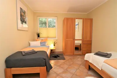 Ein Bett oder Betten in einem Zimmer der Unterkunft Am Leuchfeuer App 07