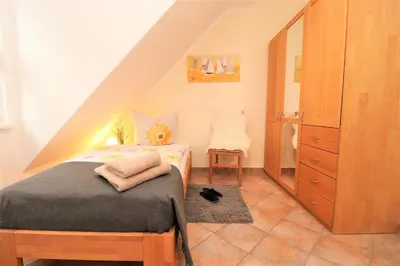 Ein Bett oder Betten in einem Zimmer der Unterkunft Am Leuchfeuer App 08